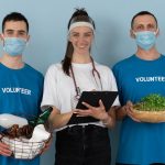 Team of volunteers engaged in community health and environmental activities with a joyful spirit.