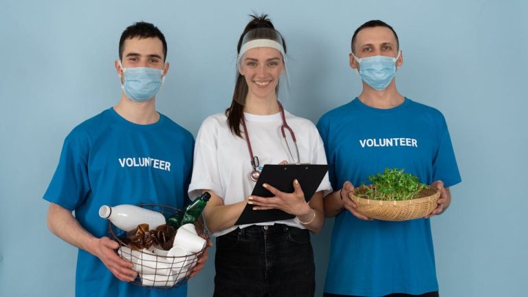 Team of volunteers engaged in community health and environmental activities with a joyful spirit.